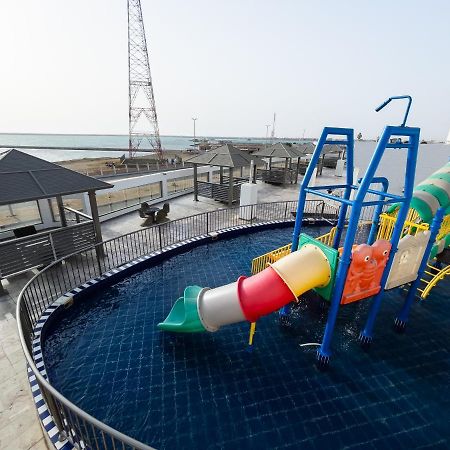 Sand Beach Suites Rayyis Bagian luar foto