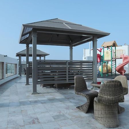 Sand Beach Suites Rayyis Bagian luar foto
