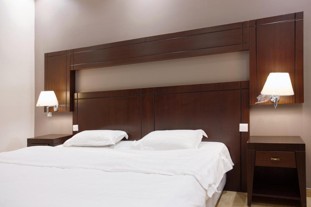 Sand Beach Suites Rayyis Bagian luar foto