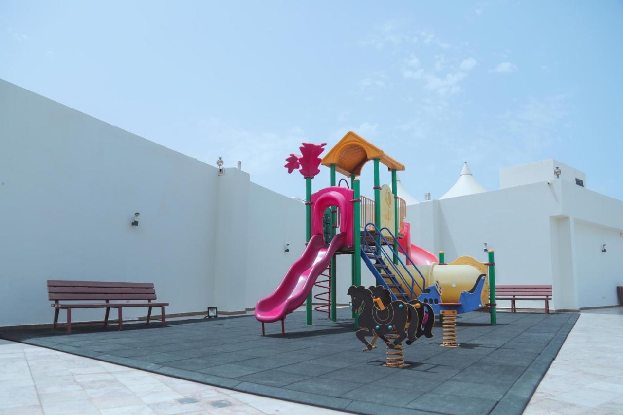 Sand Beach Suites Rayyis Bagian luar foto