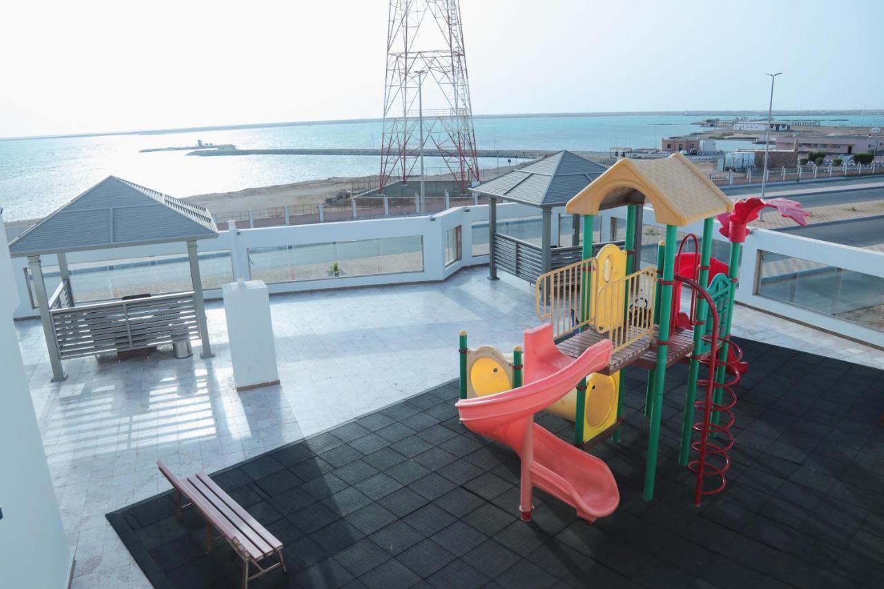 Sand Beach Suites Rayyis Bagian luar foto