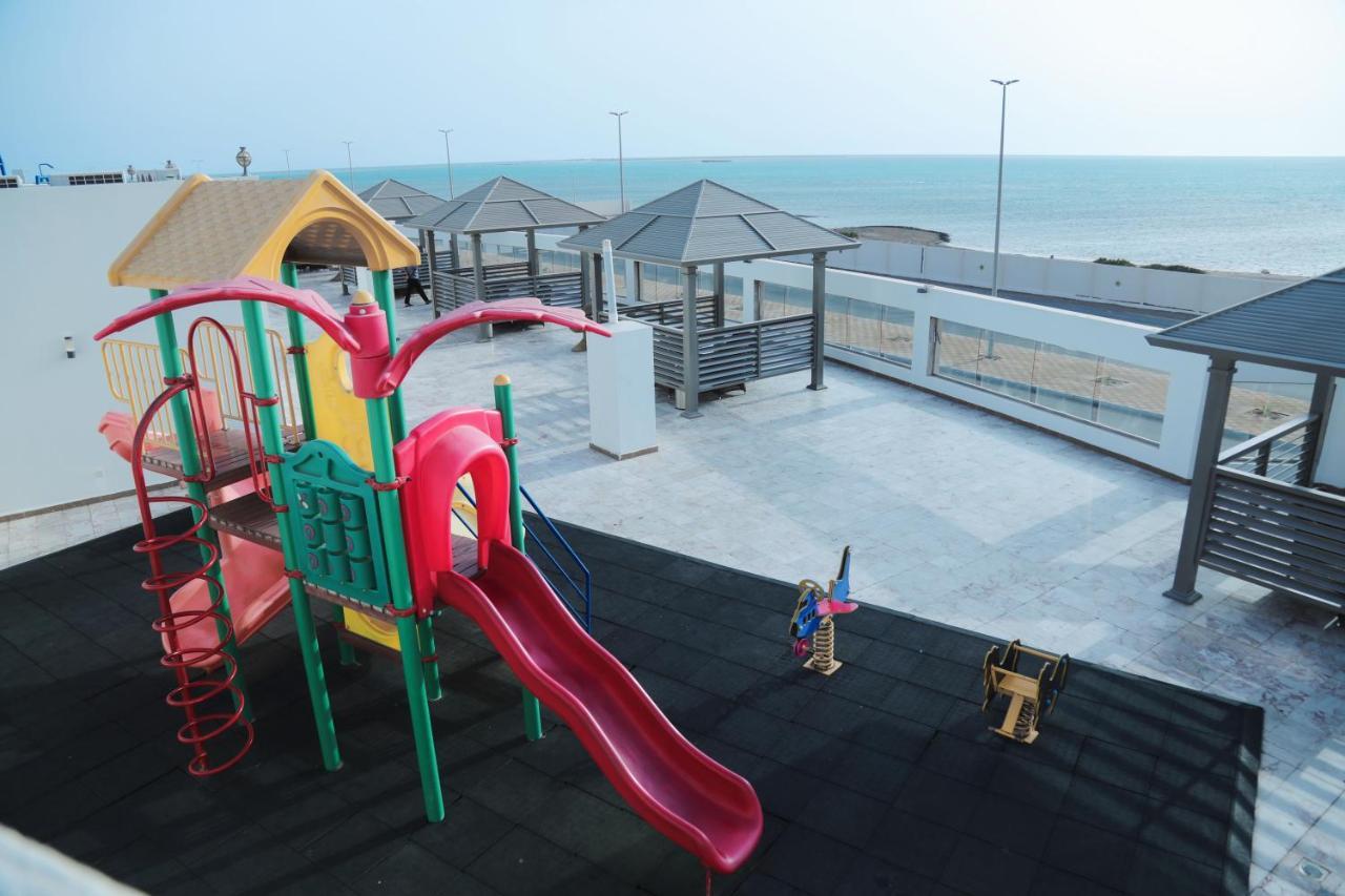 Sand Beach Suites Rayyis Bagian luar foto