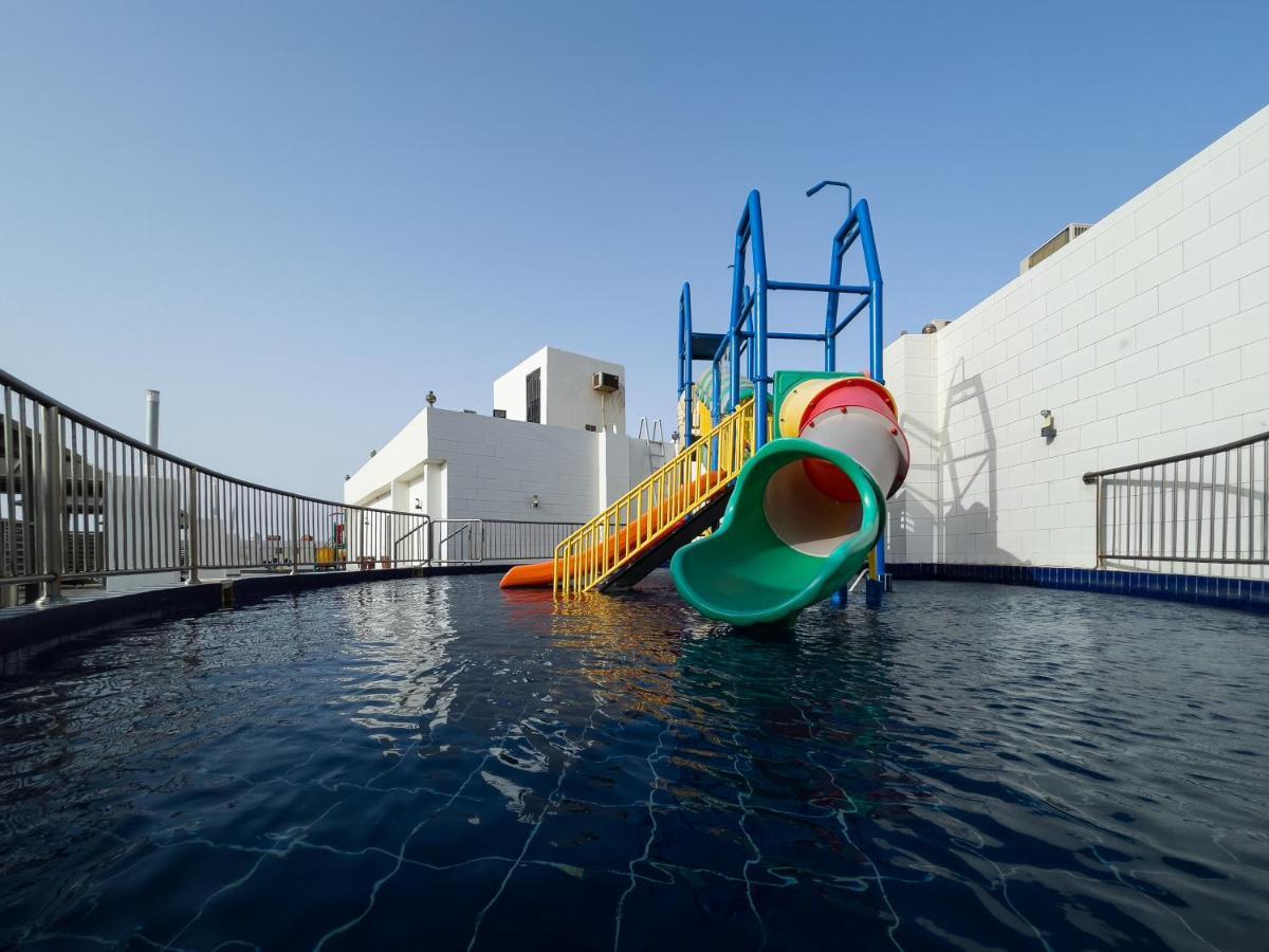 Sand Beach Suites Rayyis Bagian luar foto