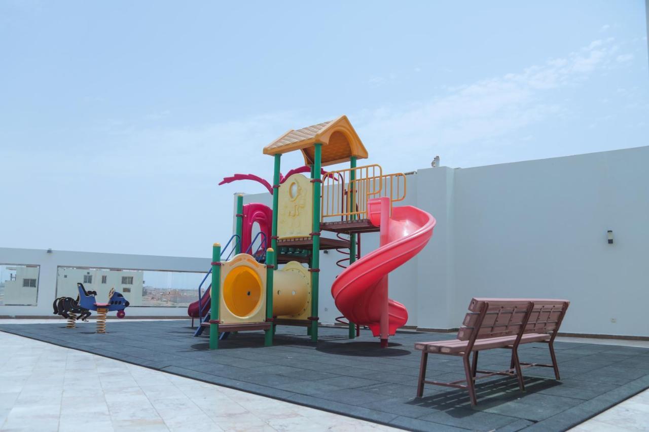 Sand Beach Suites Rayyis Bagian luar foto