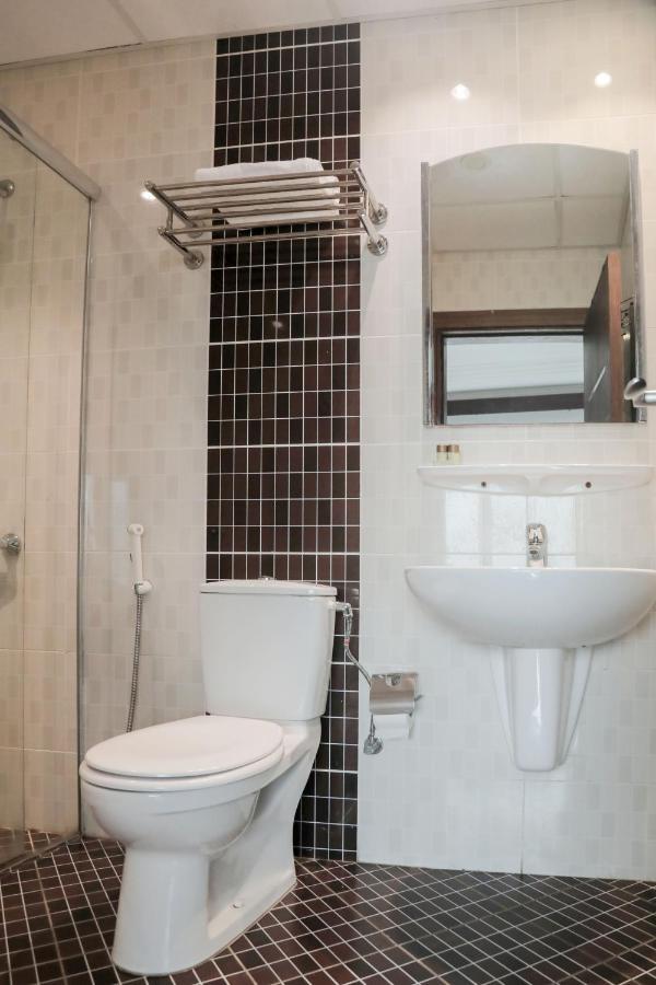 Sand Beach Suites Rayyis Bagian luar foto