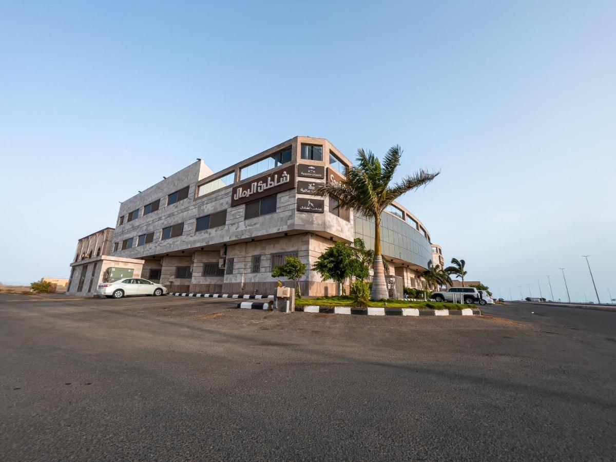 Sand Beach Suites Rayyis Bagian luar foto