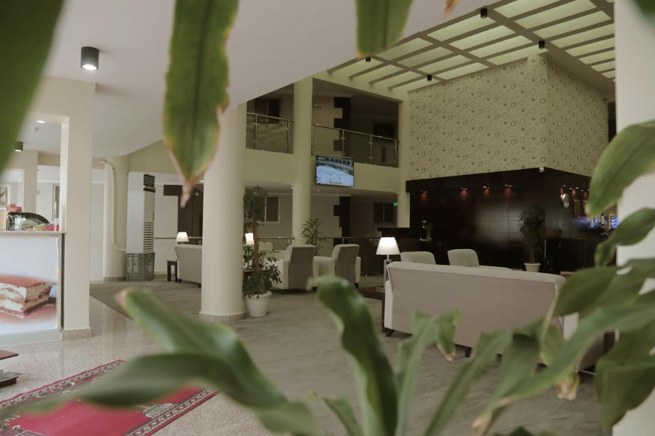 Sand Beach Suites Rayyis Bagian luar foto