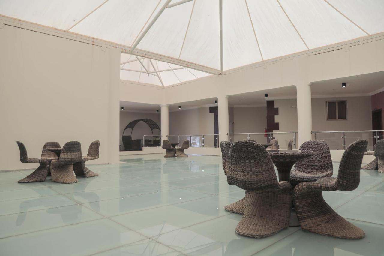 Sand Beach Suites Rayyis Bagian luar foto