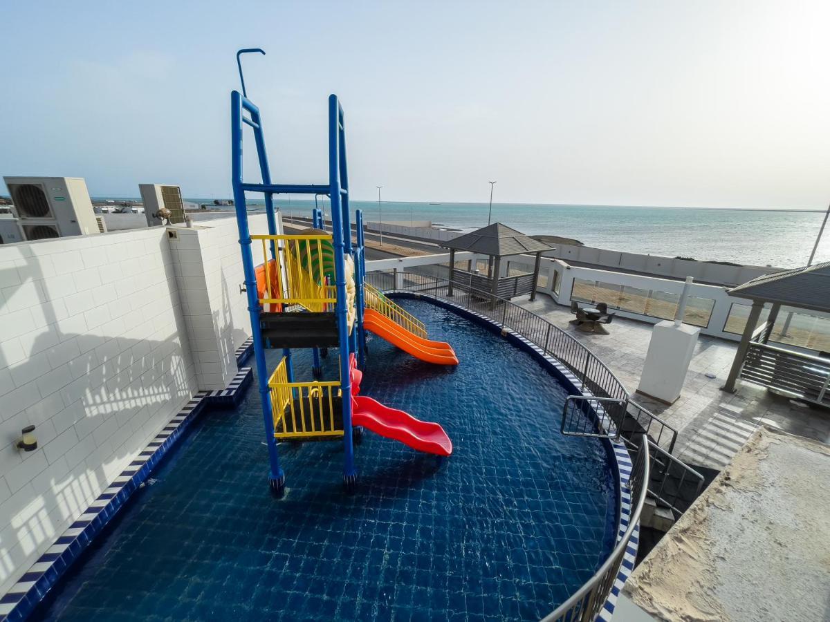 Sand Beach Suites Rayyis Bagian luar foto