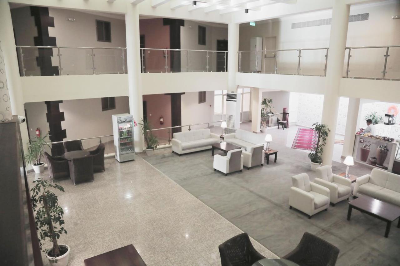 Sand Beach Suites Rayyis Bagian luar foto