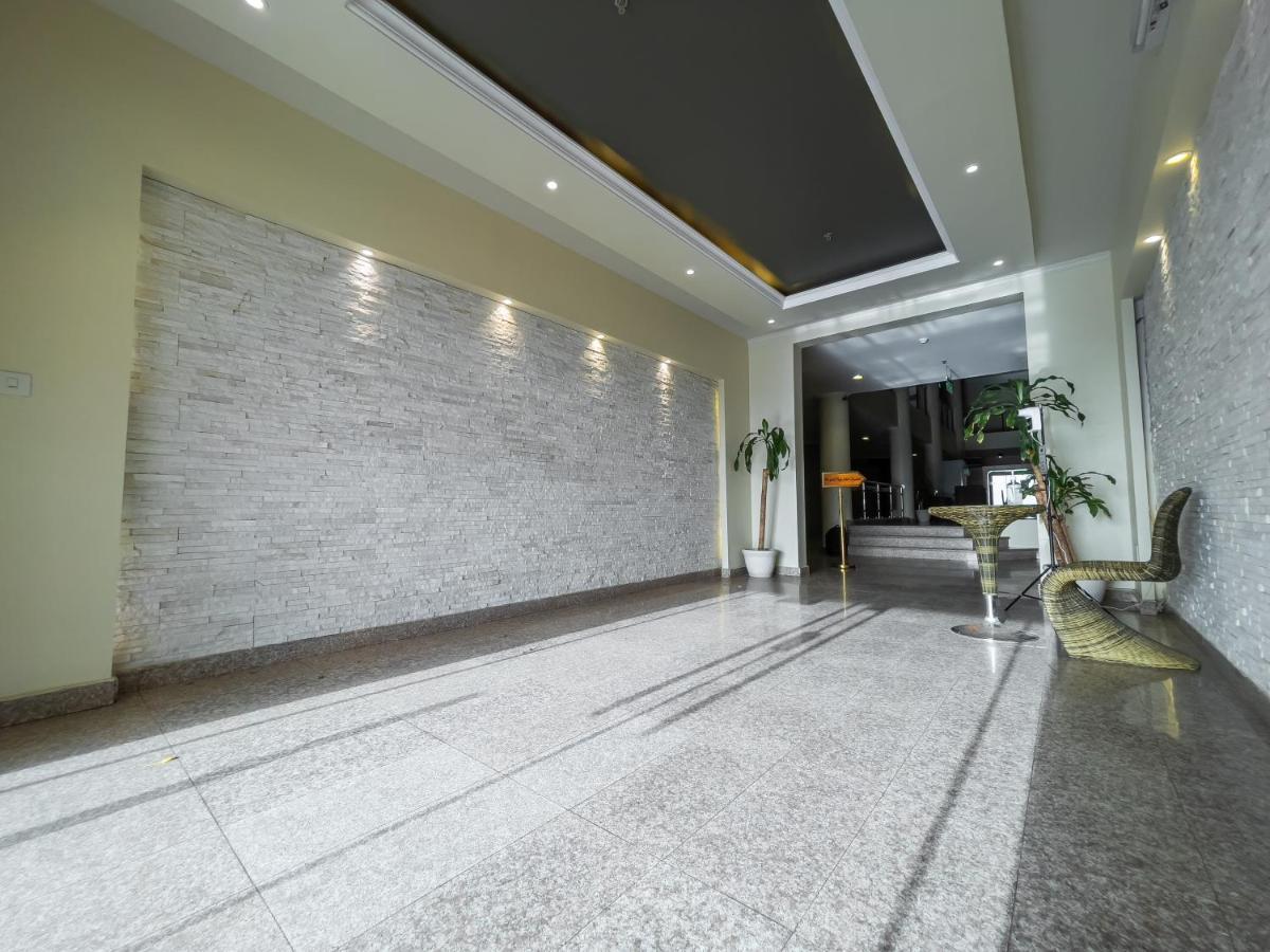 Sand Beach Suites Rayyis Bagian luar foto