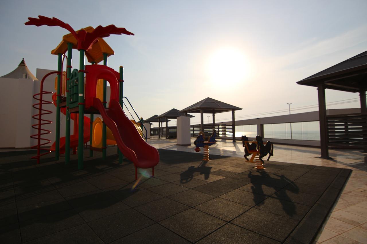 Sand Beach Suites Rayyis Bagian luar foto