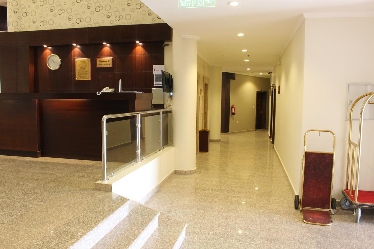Sand Beach Suites Rayyis Bagian luar foto