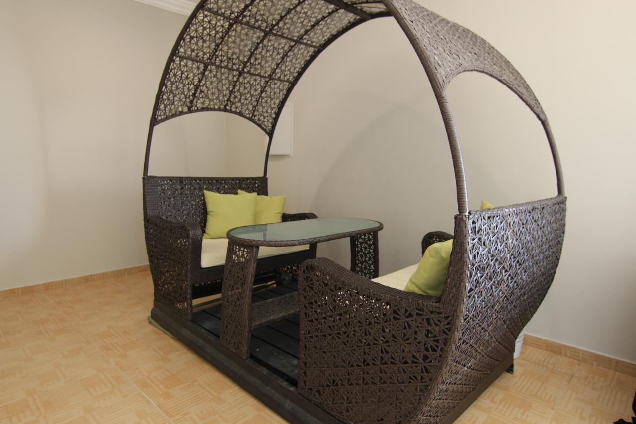 Sand Beach Suites Rayyis Bagian luar foto