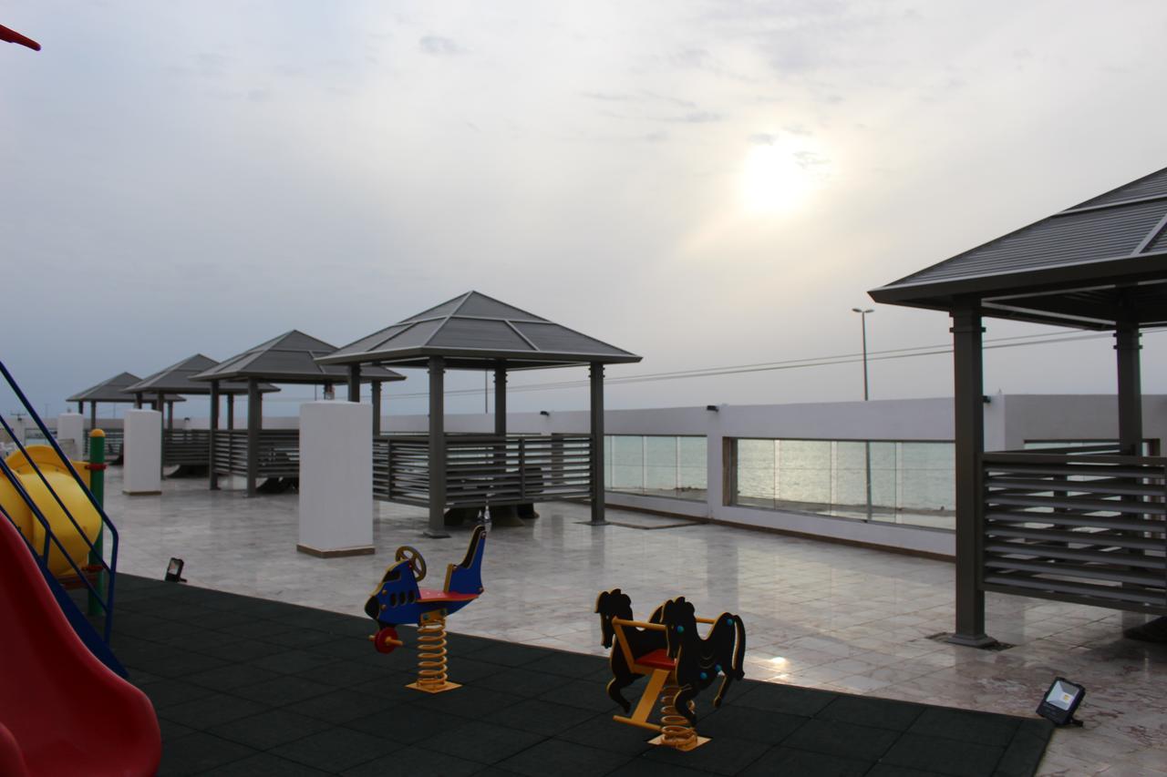 Sand Beach Suites Rayyis Bagian luar foto