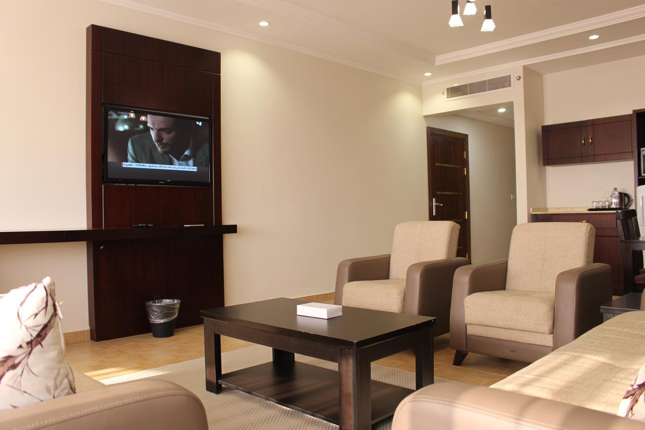 Sand Beach Suites Rayyis Bagian luar foto