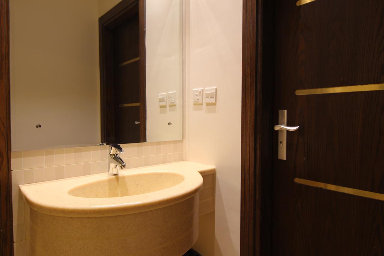 Sand Beach Suites Rayyis Bagian luar foto