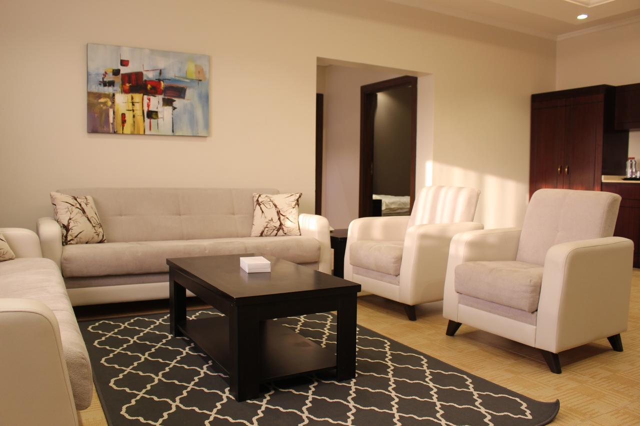 Sand Beach Suites Rayyis Bagian luar foto