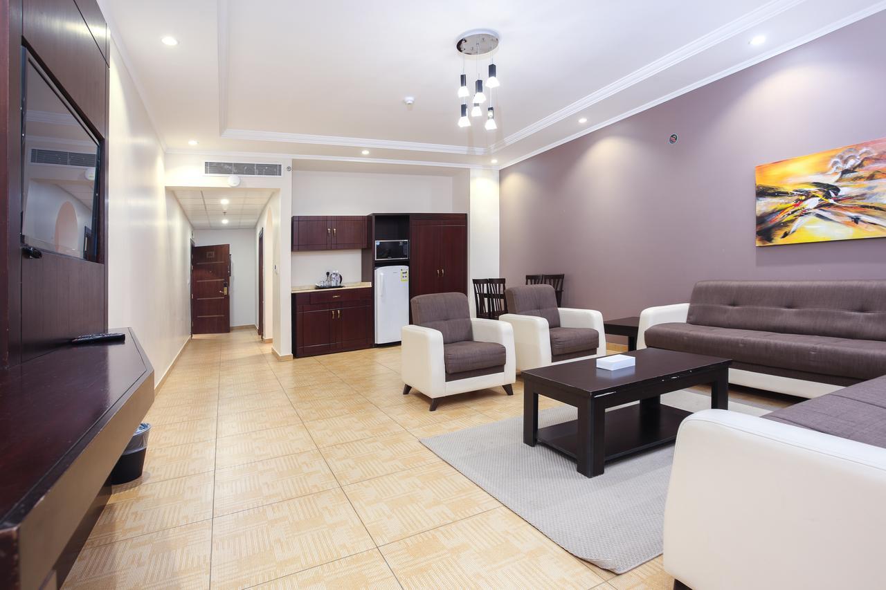 Sand Beach Suites Rayyis Bagian luar foto