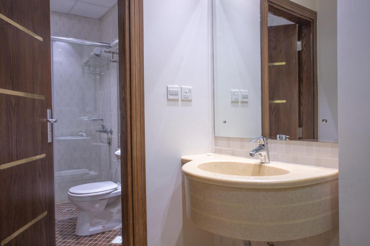 Sand Beach Suites Rayyis Bagian luar foto