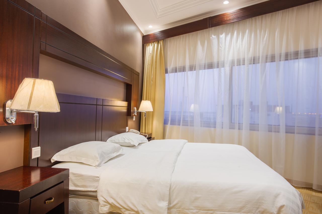 Sand Beach Suites Rayyis Bagian luar foto