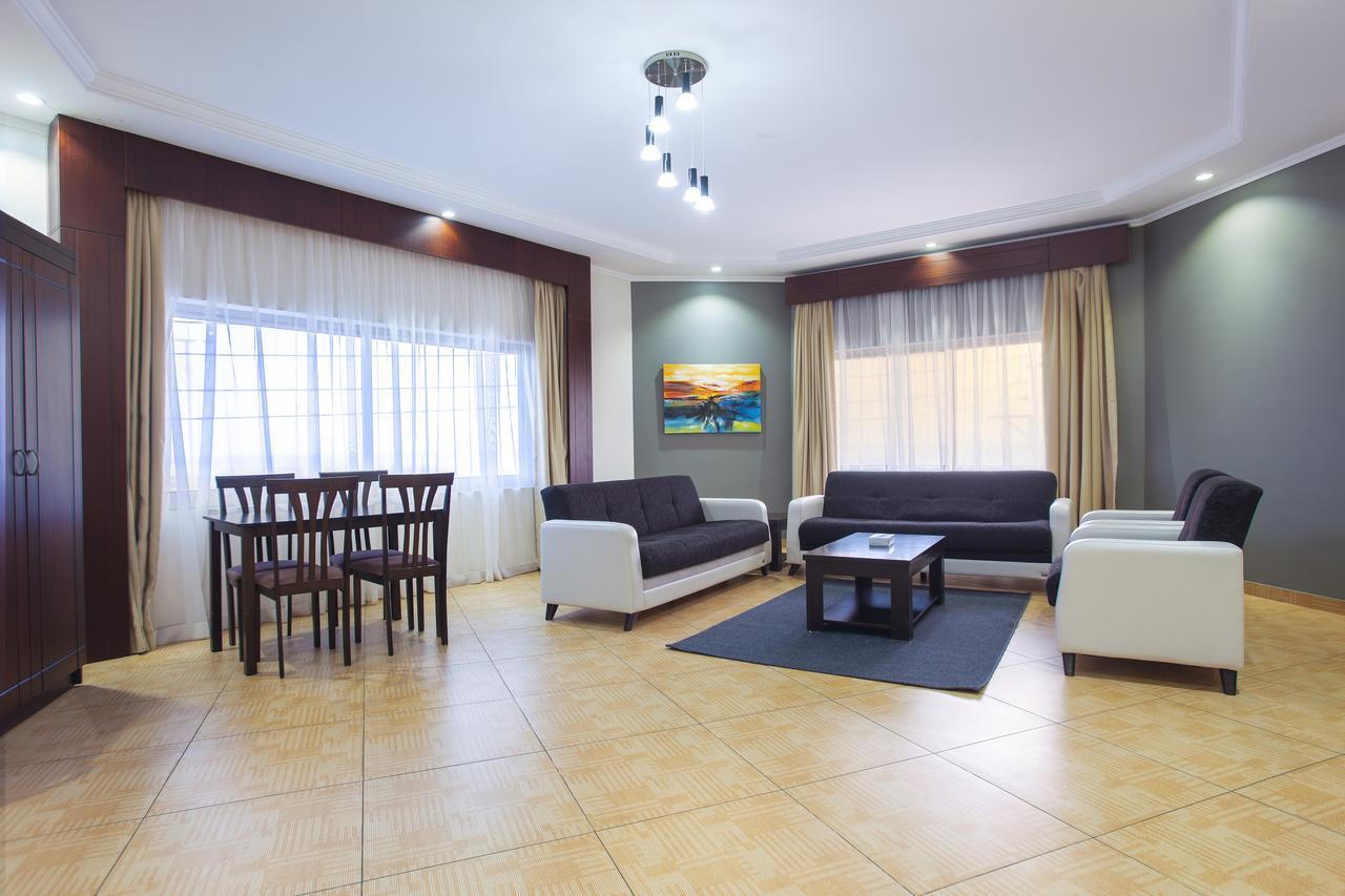 Sand Beach Suites Rayyis Bagian luar foto