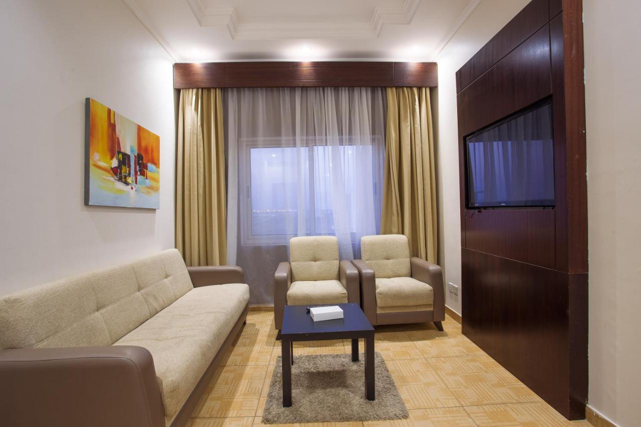 Sand Beach Suites Rayyis Bagian luar foto