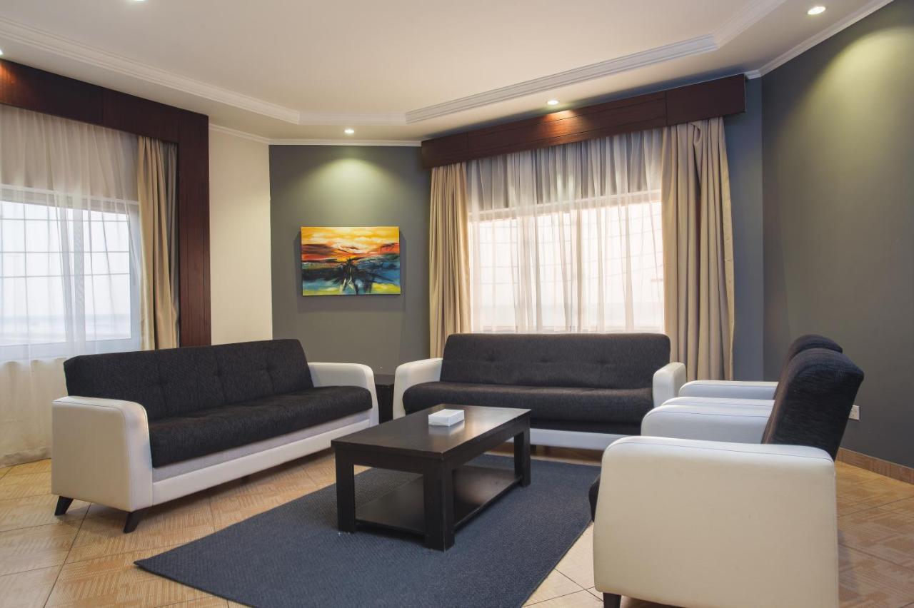 Sand Beach Suites Rayyis Bagian luar foto