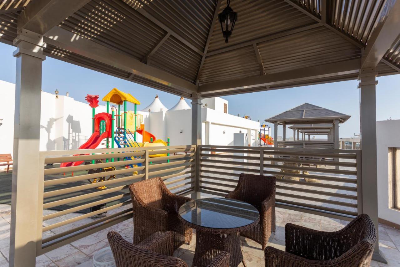 Sand Beach Suites Rayyis Bagian luar foto