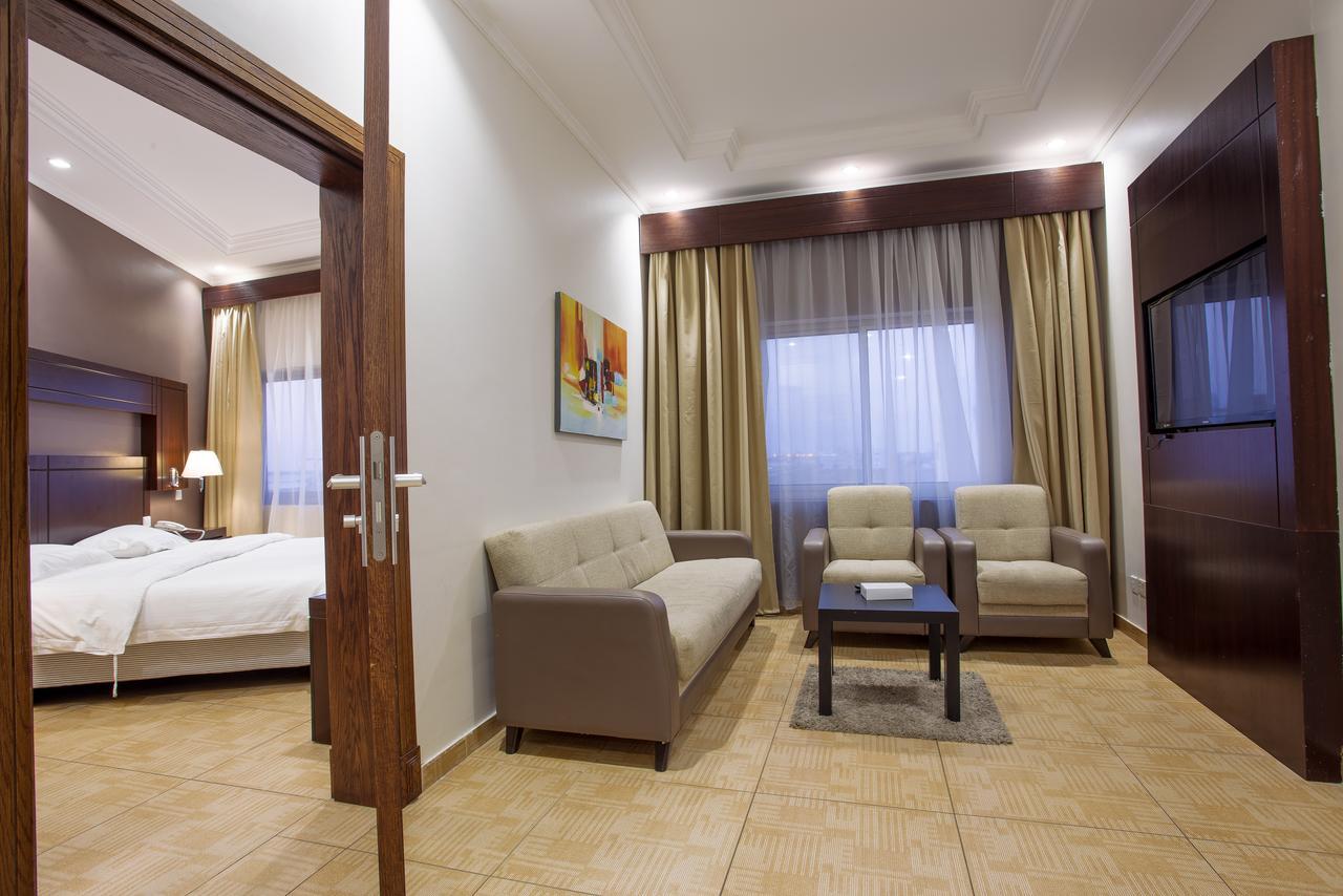 Sand Beach Suites Rayyis Bagian luar foto