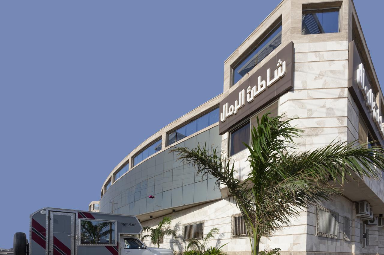 Sand Beach Suites Rayyis Bagian luar foto