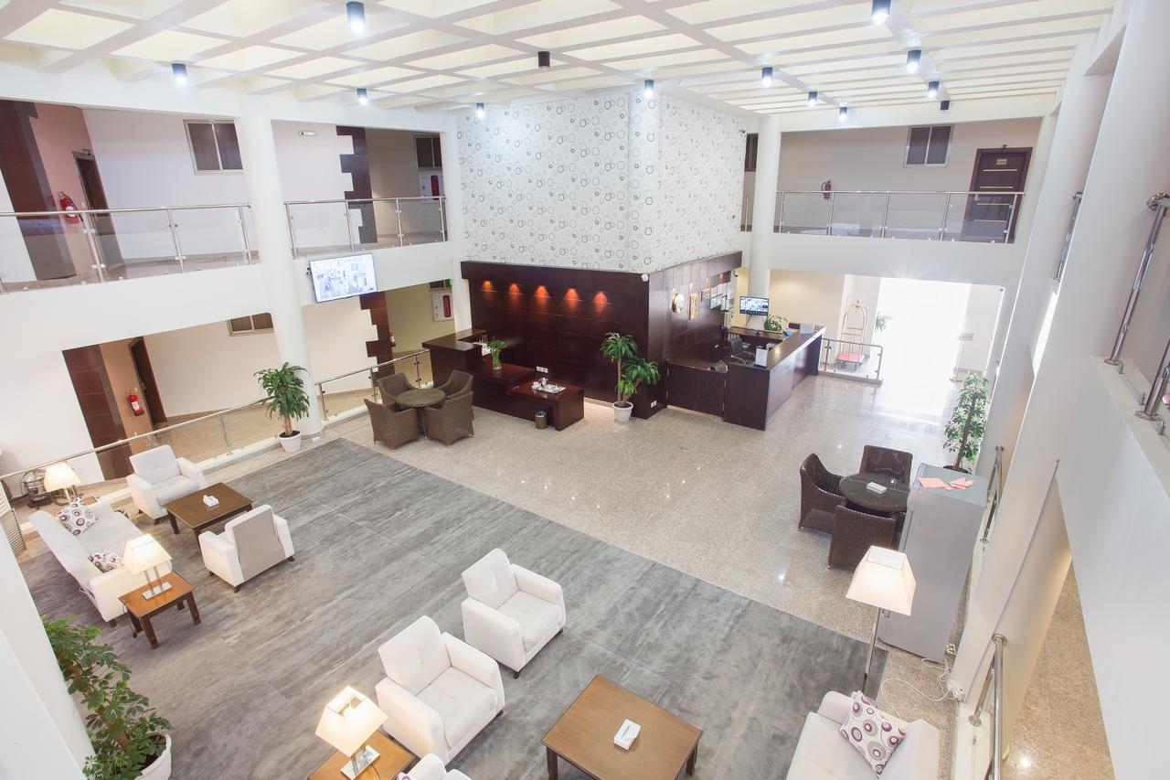 Sand Beach Suites Rayyis Bagian luar foto