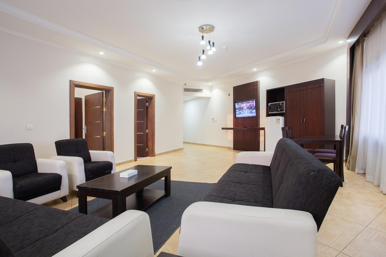 Sand Beach Suites Rayyis Bagian luar foto